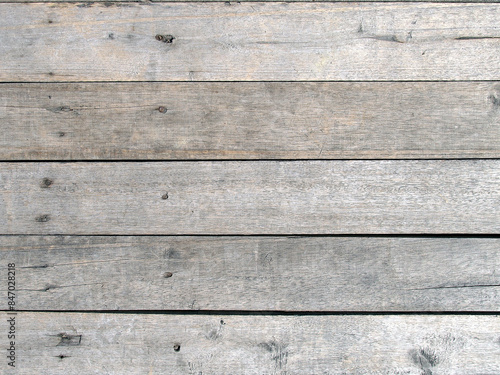 grey hardwood panel of pier walkway floor, rough textured rustic wood plank