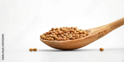 A photograph of a wooden spoon filled with chickpeas on a white background, perfect for use in recipes or as a prop