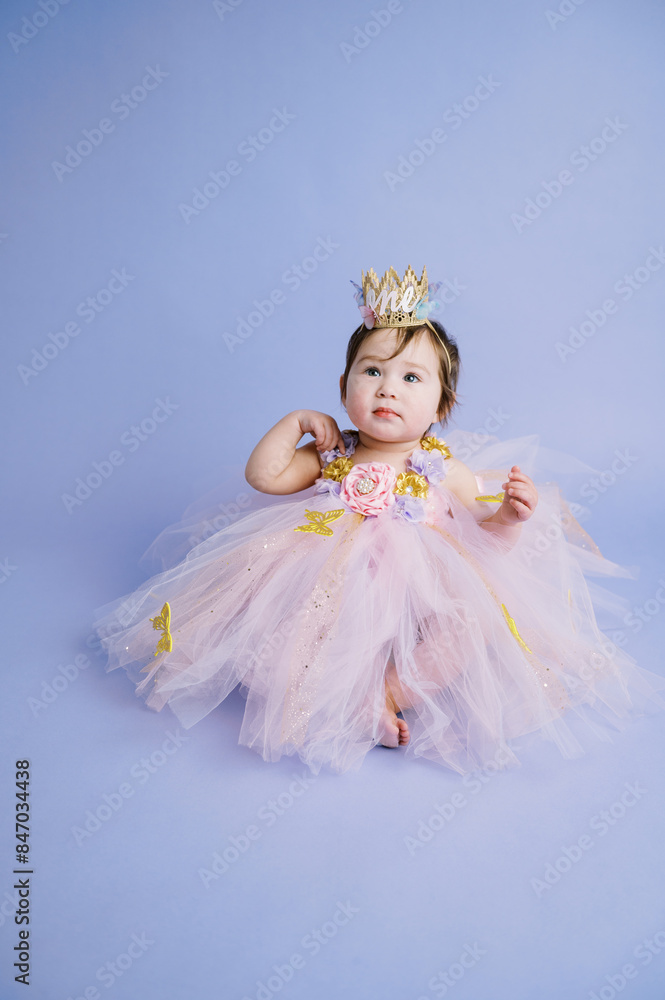 portrait of infant girl in birthday outfit portrait of infant girl in birthday outfit