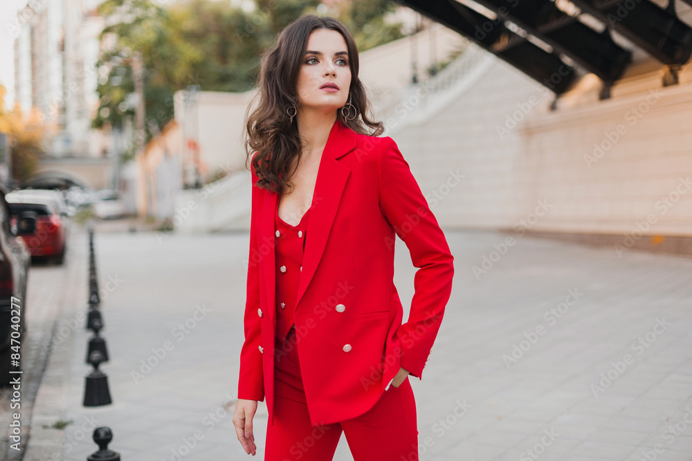beautiful sexy rich business woman in red suit walking in city street, spring summer fashion trend beautiful sexy rich business woman in red suit walking in city street, spring summer fashion trend