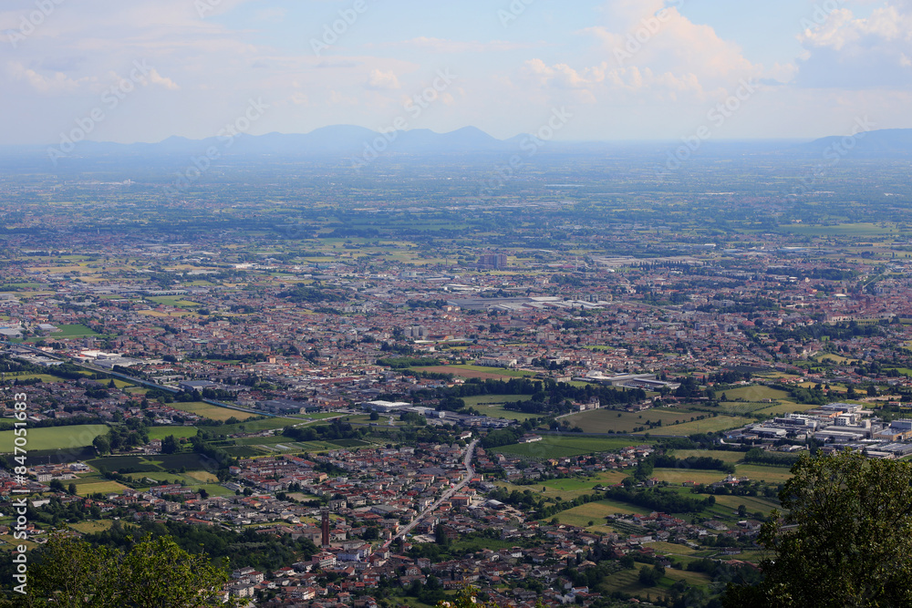 Top view of a sprawling urban landscape with houses buildings and factories Top view of a sprawling urban landscape with houses buildings and factories
