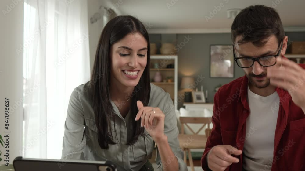Couple prepare documents for work have coffee and breakfast at home Couple prepare documents for work have coffee and breakfast at home