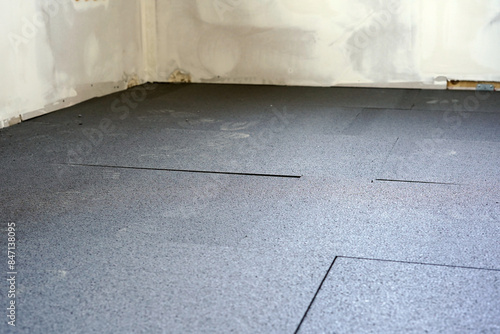 Styrofoam laid on the floor. It warms up.