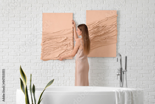Young woman hanging 3D pict...