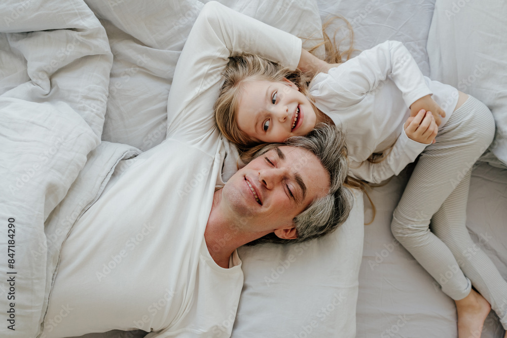 Father-daughter cuddle time Father-daughter cuddle time