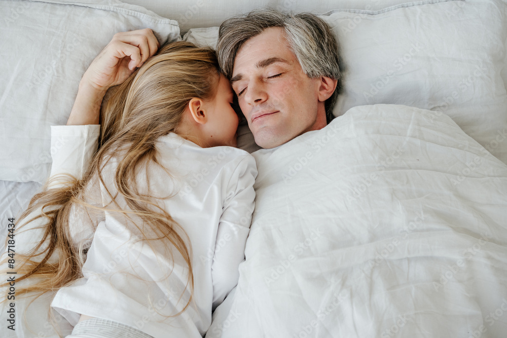 Father and daughter sleeping peacefully Father and daughter sleeping peacefully