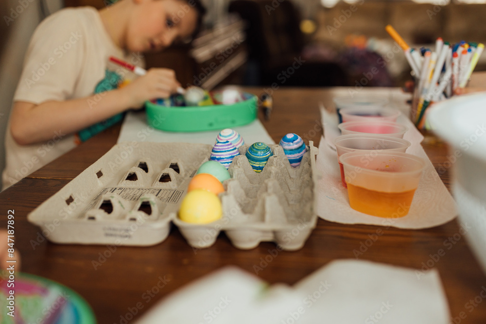 © Jessica Byrum/Stocksy - Easter Crafts At The Kitchen Table