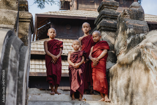 Wallpaper Mural Group of young monks on temple steps Torontodigital.ca