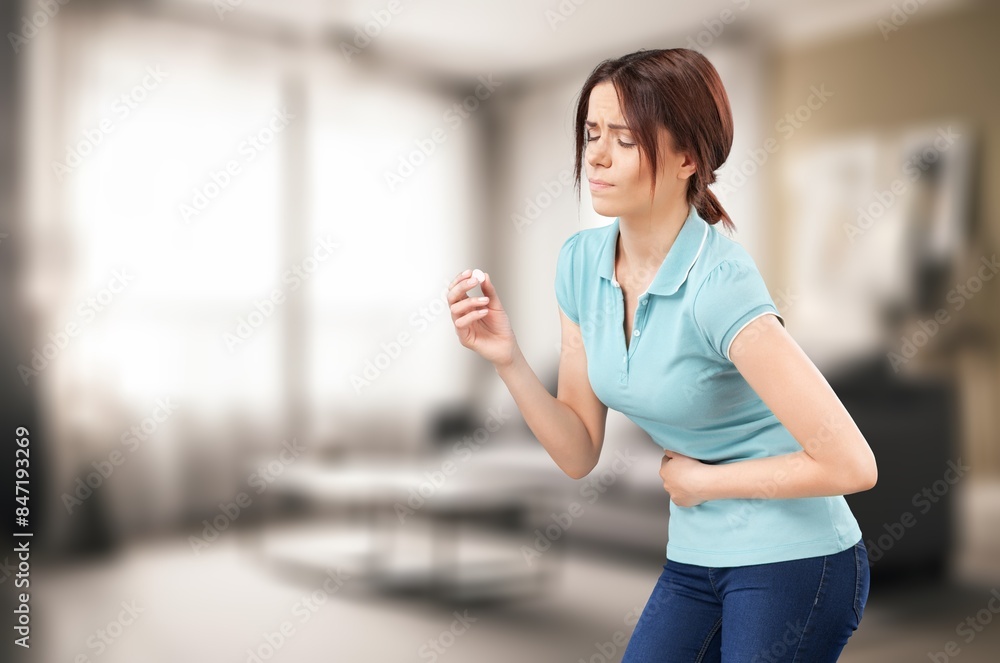 Unhappy sick young woman suffering from pain Unhappy sick young woman suffering from pain
