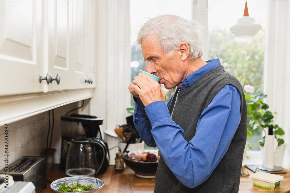 Senior man drinking coffee in morning Senior man drinking coffee in morning