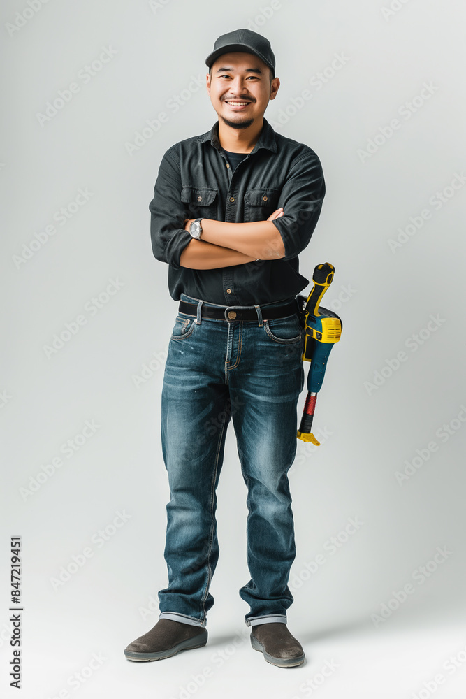 Confident plumber smiling with arms crossed on white background Confident plumber smiling with arms crossed on white background