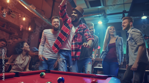group of friends playing pool in a bar or club setting enjoying and smiling