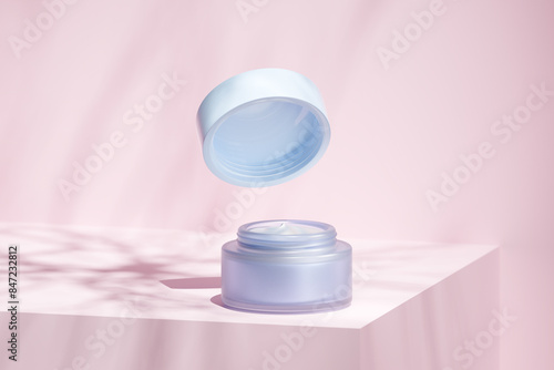 Face / hand cream on pink podium. Skin care. 