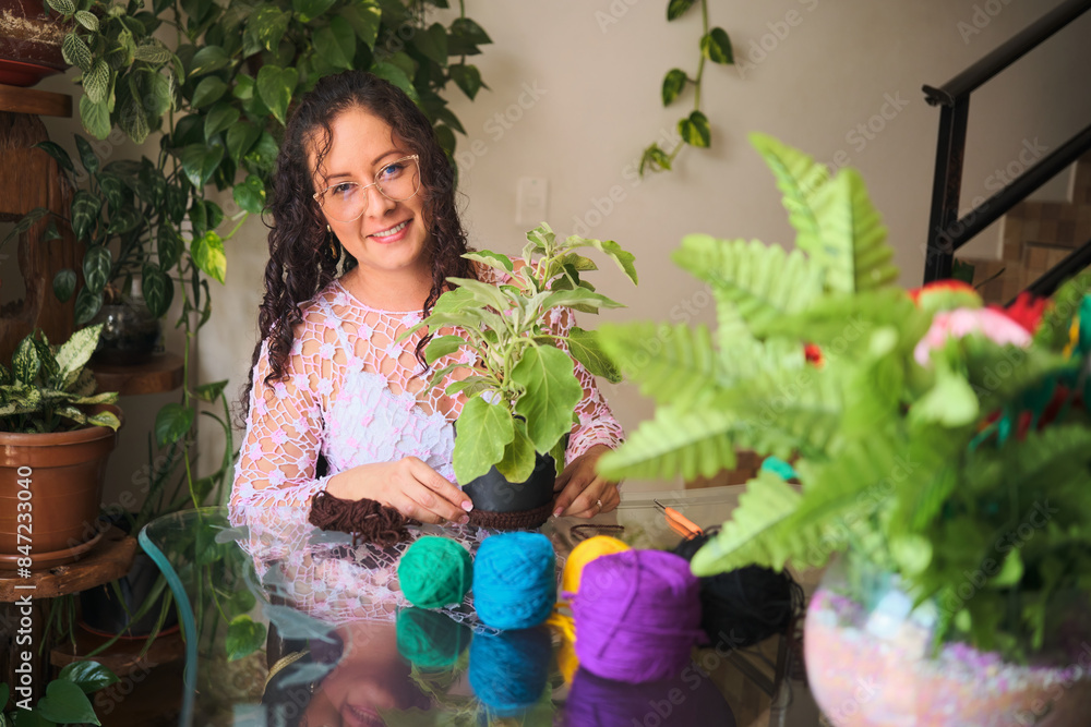 Latin craftswoman crocheting Latin craftswoman crocheting