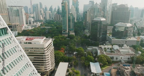 Aerial view modern office building with green Lumpini public park Silom disrict sightseeing travel in Thailand photo