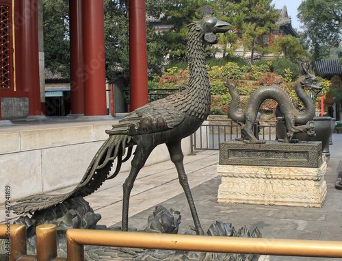 The statue of a legendary fenghuang bird from Chinese mythology, similar to the Greek and Egyptian phoenix, located within the Summer Palace complex in Beijing, China. photo