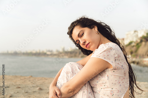Toughtful Woman at the Beach photo