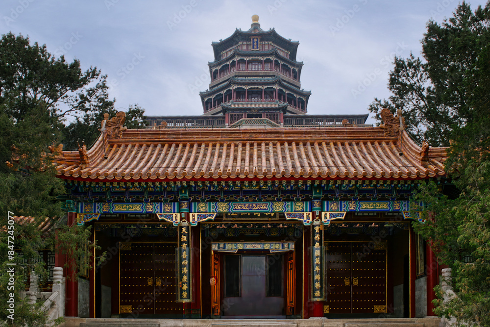 The magnificent temple and the splendid pagoda that characterize the entrance to the Summer Palace complex in Beijing, (China) an example of classical Chinese architecture. The magnificent temple and the splendid pagoda that characterize the entrance to the Summer Palace complex in Beijing, (China) an example of classical Chinese architecture.