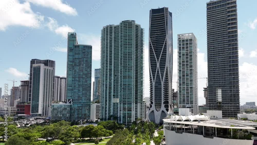 rising capture of downtown miami buildings showing skyscrapers during a bright sunny day in south florida metropolis rising capture of downtown miami buildings showing skyscrapers during a bright sunny day in south florida metropolis