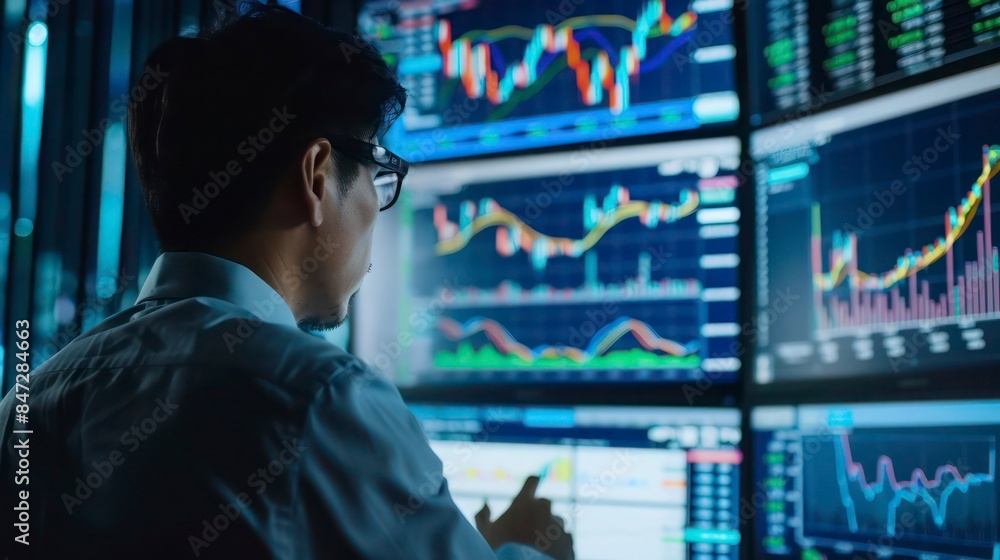 Businessman Analyzing Stock Market Trends Businessman Analyzing Stock Market Trends