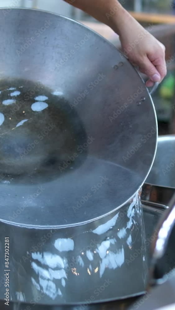 iron bowl in the kitchen pour water into a large saucepan cook food boil water
