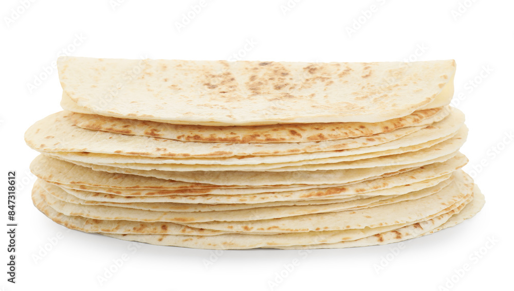 Many tasty homemade tortillas isolated on white