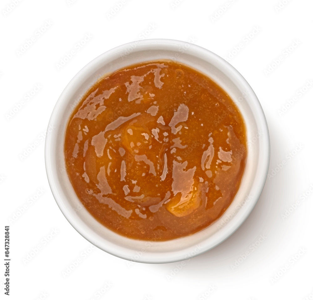 Apricot jam isolated on white background, top view Apricot jam isolated on white background, top view