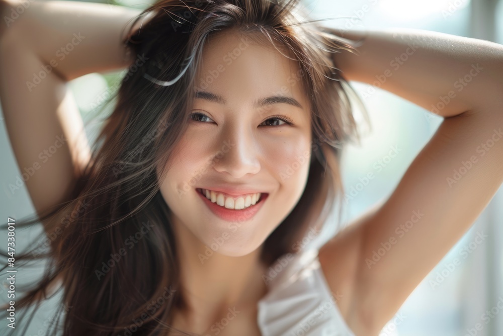 Fototapeta premium Smiling Woman Posing Joyfully Indoors