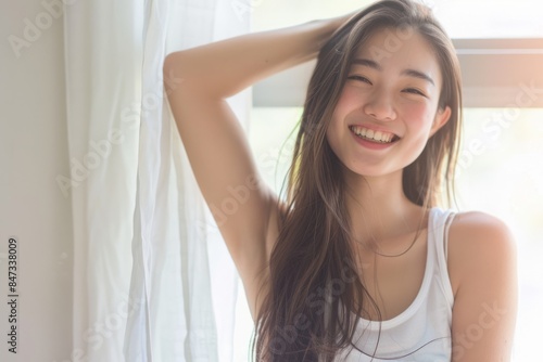 Smiling Woman in Sunlit Room