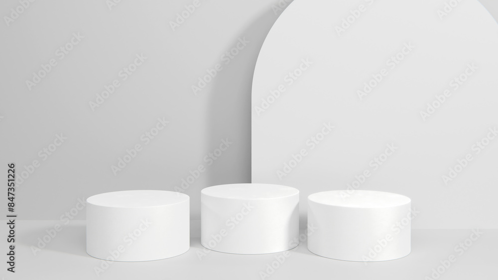 Background for product showcasing. Three white cylindrical stand on a gray background. 3D rendering. Background for product showcasing. Three white cylindrical stand on a gray background. 3D rendering.