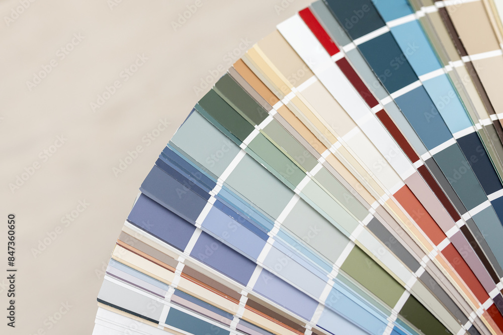 Obraz premium A fan of paint swatches showcasing a wide range of colors.