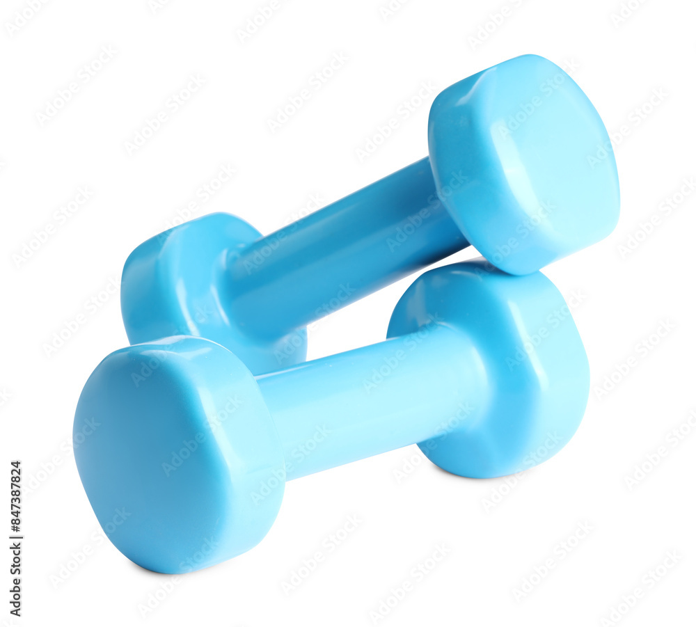 Light blue dumbbells isolated on white. Sports equipment Light blue dumbbells isolated on white. Sports equipment