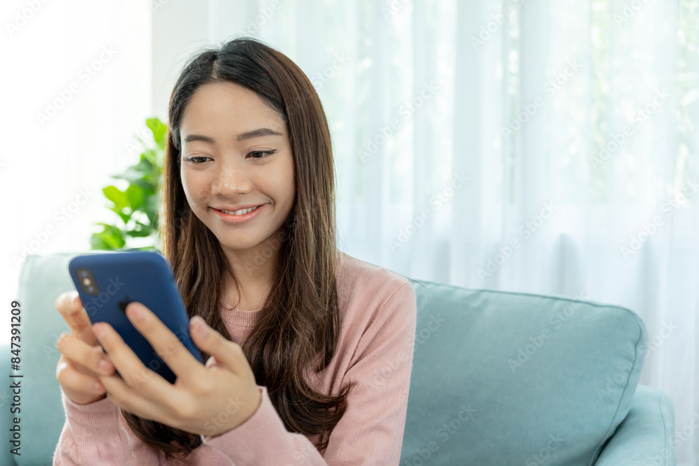woman using smartphone for online shopping at home. Hand holding mobile phone with payment detail page display and credit card, stay home, technology, electronic commerce, internet, market place woman using smartphone for online shopping at home. Hand holding mobile phone with payment detail page display and credit card, stay home, technology, electronic commerce, internet, market place