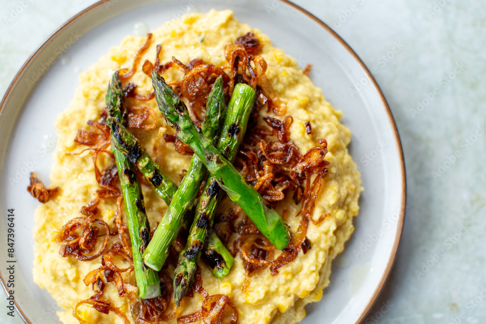 Mashed sweetcorn and butterbeans with asparagus and fried shallots. Mashed sweetcorn and butterbeans with asparagus and fried shallots.