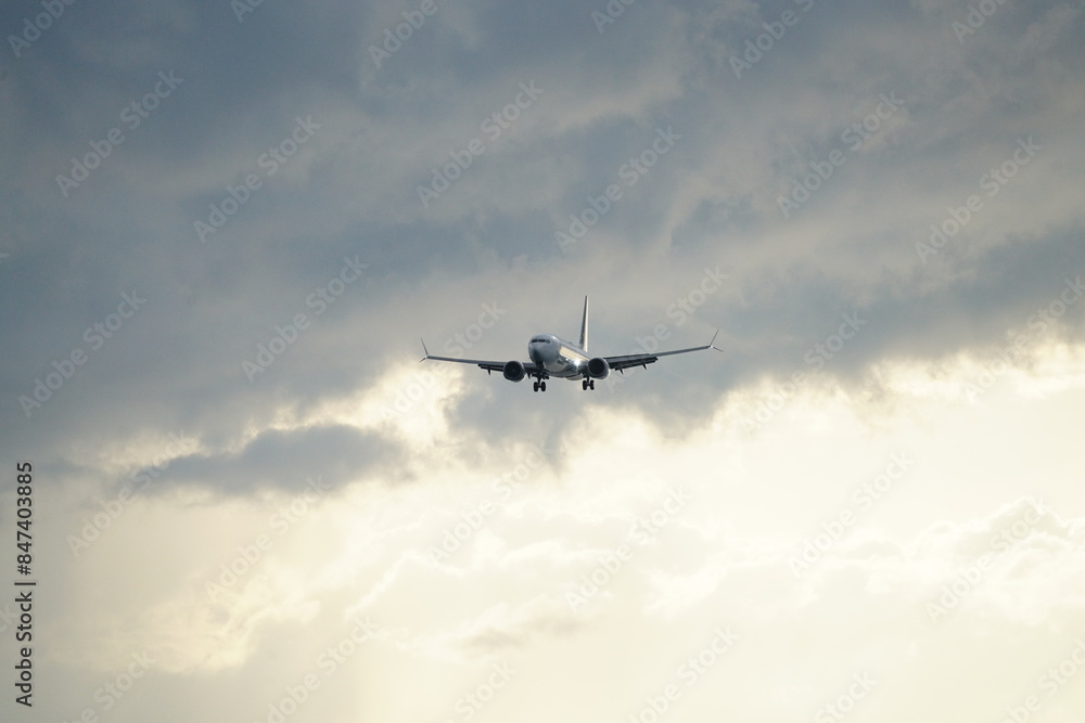 airplane in sunset skies airplane in sunset skies