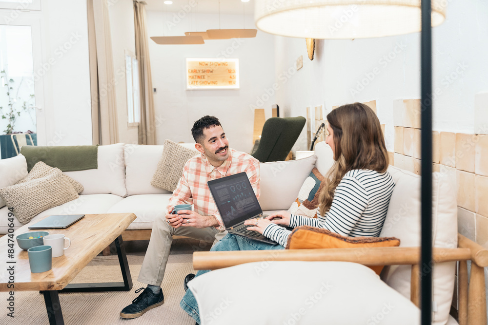 Young Professionals Collaborate In A Modern Office. Young Professionals Collaborate In A Modern Office.