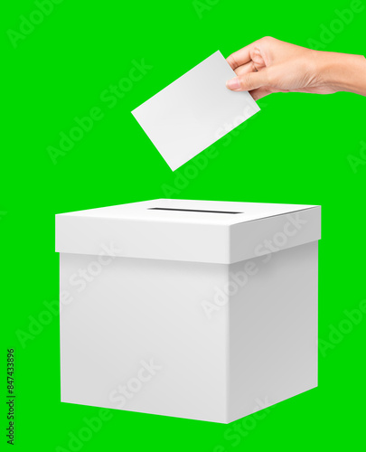 Close up of a ballot box and casting vote on white background. Voting box and election image. Hand holding paper inseting paper. Isolated on White Background.