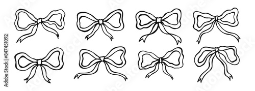 Hand drawn set of bows ribbon isolated on white background. Black bow doodle collection.
