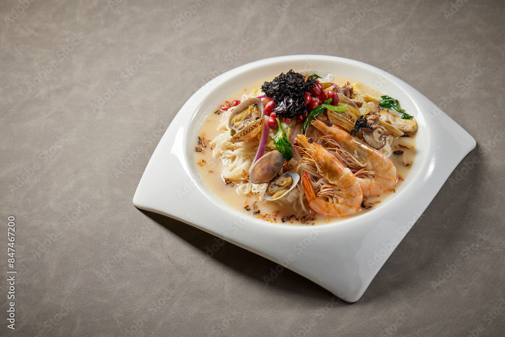 traditional chinese set seafood fried putian noodle with dumpling dim sum bao and soup snack vegetable in plate on grey vintage background cafe hotel luxury halal food restaurant banquet menu