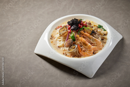Obraz na płótnie traditional chinese set seafood fried putian noodle with dumpling dim sum bao and soup snack vegetable in plate on grey vintage background cafe hotel luxury halal food restaurant banquet menu w salonie