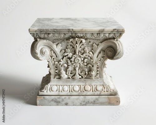 Ornate marble pedestal with intricate carvings, ideal for classical interior decor or art display, showcasing exquisite craftsmanship.