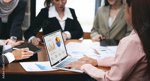 Vászonkép Diverse business woman workgroup team discuss paperwork financial report statistical data, forecasting working on common project