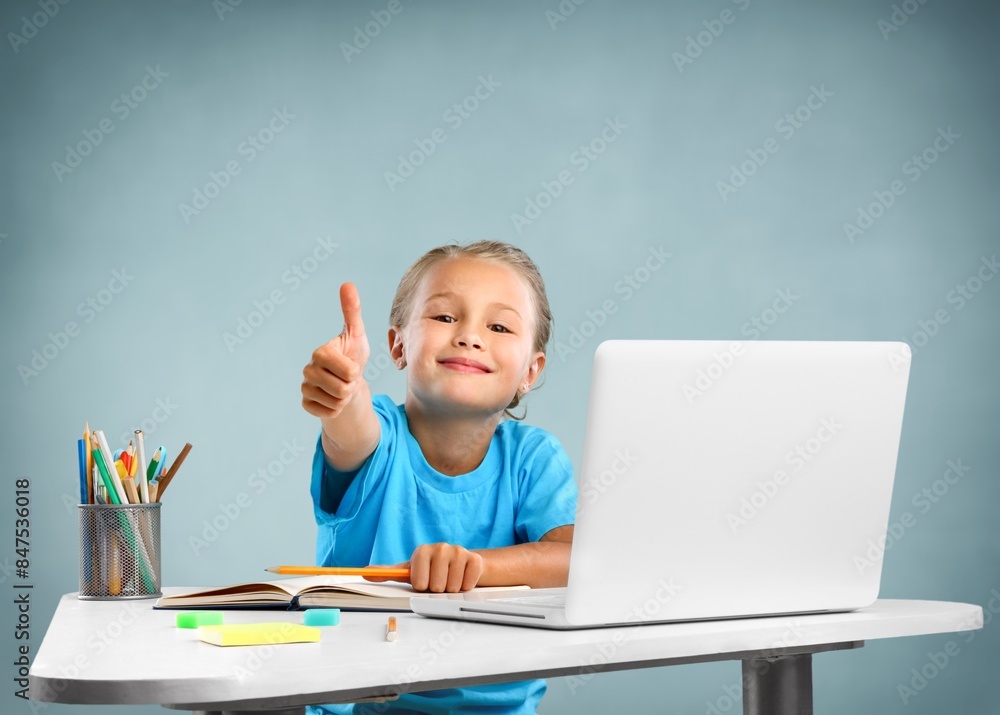 Portrait of small student studying in class Portrait of small student studying in class