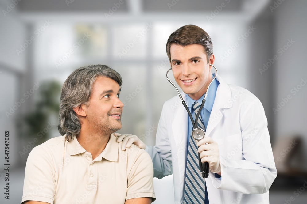 Shot of doctor talking medical treatment to patient in consultation. Shot of doctor talking medical treatment to patient in consultation.