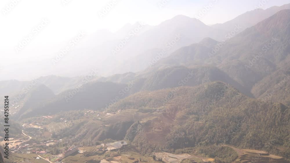 looking down on small villages in a valley in Sapa in Northern Vietnam looking down on small villages in a valley in Sapa in Northern Vietnam