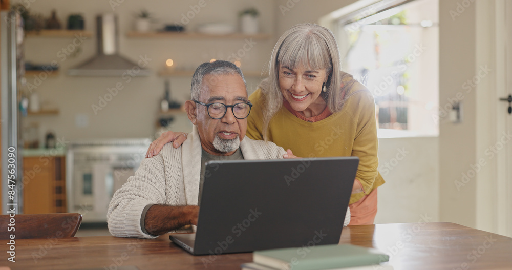 Senior couple, home and laptop for internet research with for retirement and social media update. Interracial marriage, old man and woman with computer in kitchen for video call app and virtual chat Senior couple, home and laptop for internet research with for retirement and social media update. Interracial marriage, old man and woman with computer in kitchen for video call app and virtual chat