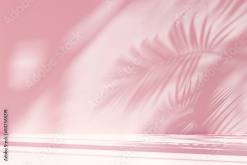 Modern minimalistic light pink background with blurred palm leaves shadow and white floor for product presentation