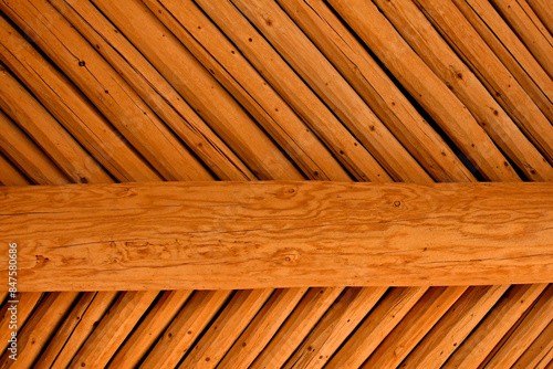 Hand hewn Latillas are laid diagonally on Vigas to create distinctive roof in the Pueblo Architectural Style, Albuquerque, New Mexico  photo