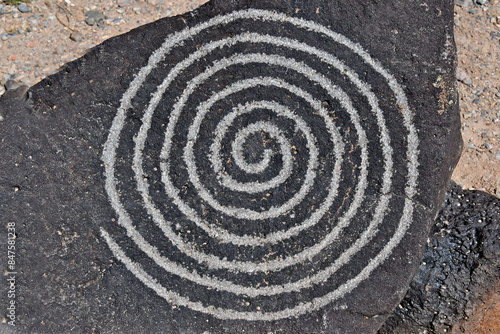 To discourage visitors from touching ancient petroglyphs a machine made petroglyph allow visitors to touch a facsimile, Petroglyph National Monument, Albuquerque, NM