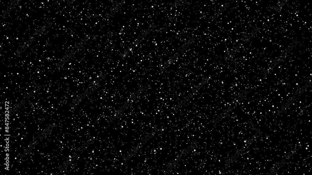 Snowflakes falling like stars in a dark winter night Snowflakes falling like stars in a dark winter night